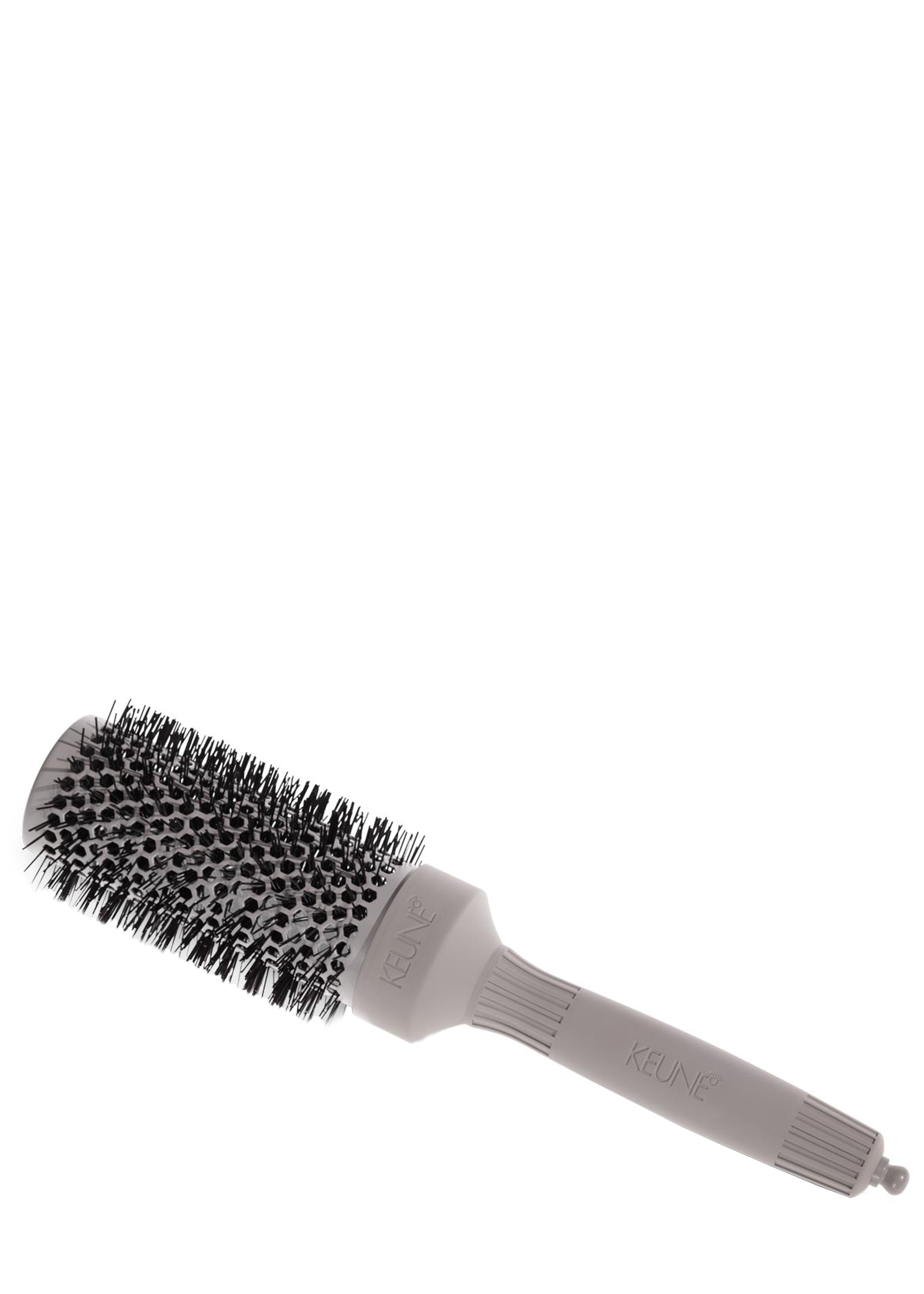 1. KEUNE CERAMIC ROUND BRUSH 42MM: The professional hairbrush for vibrant blowouts, volume, and curls. Styling tools available on keune.ch.